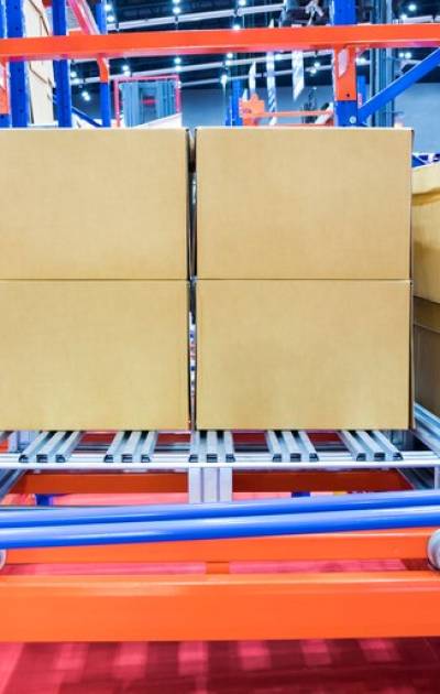 row-cotton-boxes-kept-warehouse-shelves_29362-72